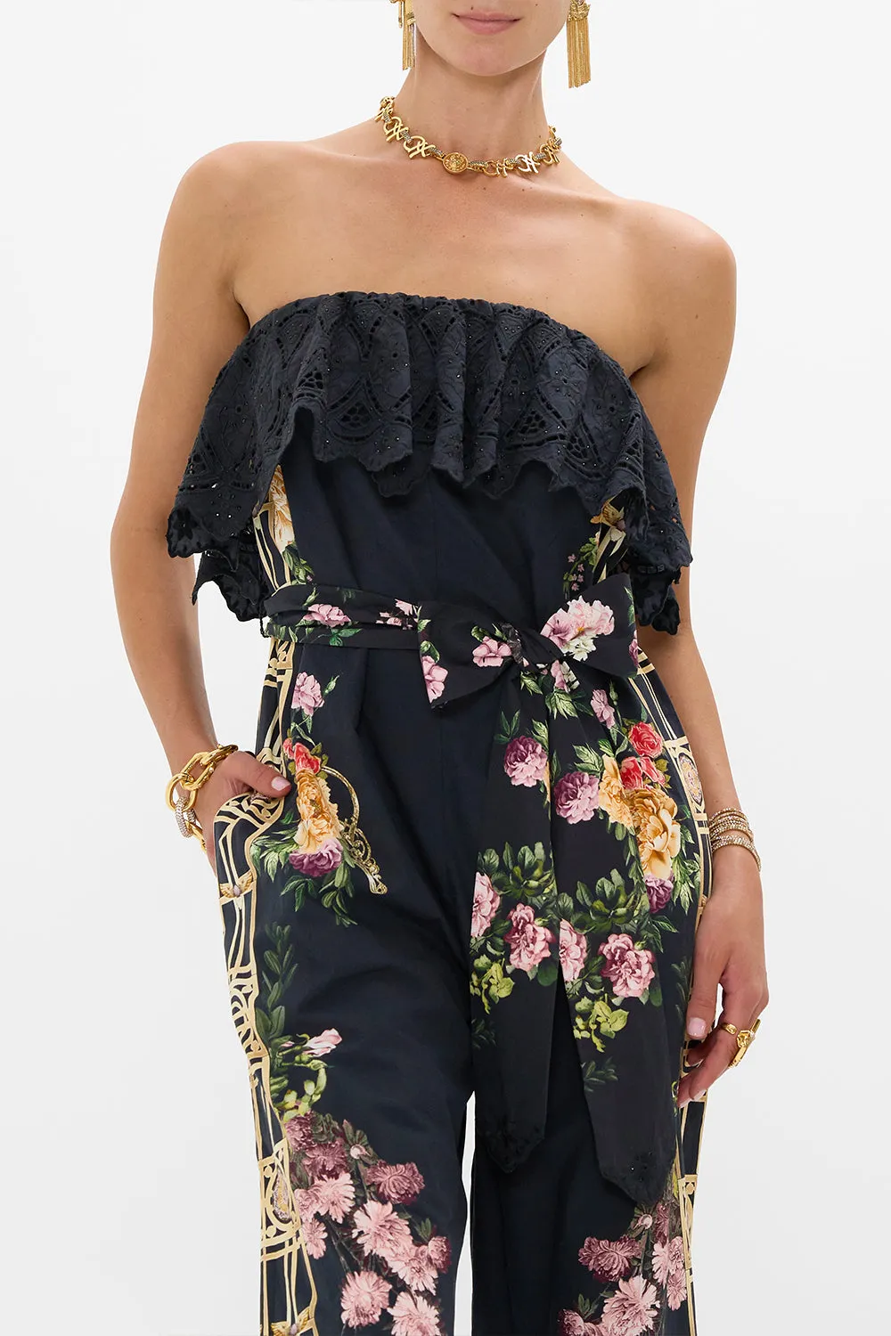 STRAPLESS JUMPSUIT WITH FRILL ADORNED IN ALEXANDRIA