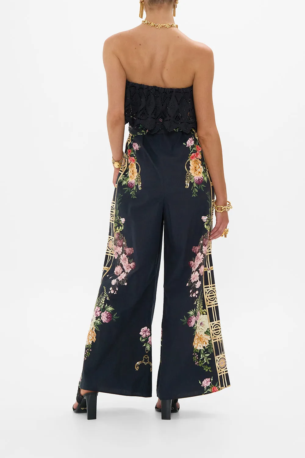 STRAPLESS JUMPSUIT WITH FRILL ADORNED IN ALEXANDRIA